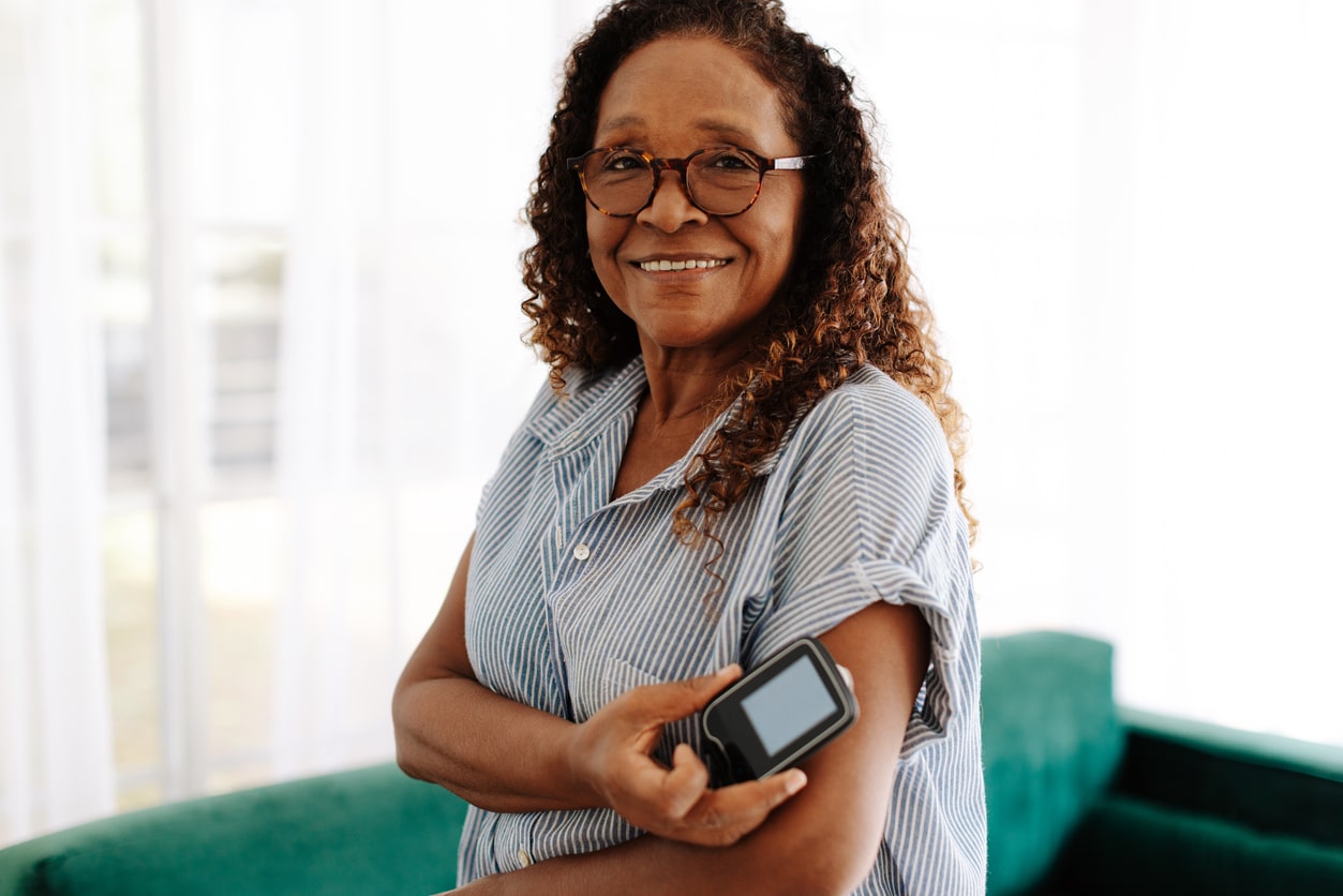 Woman checking her blood sugar levels.
